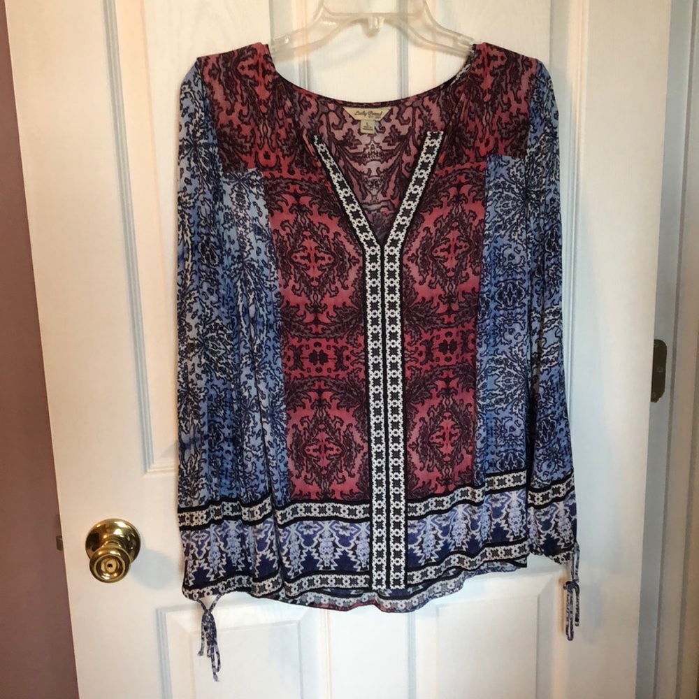 Lightweight blouse with ties on sleeves